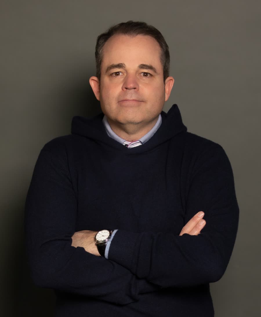 Portrait of Rick Silva, Class A PGA Professional and founder of Movement 3 Golf, arms folded
